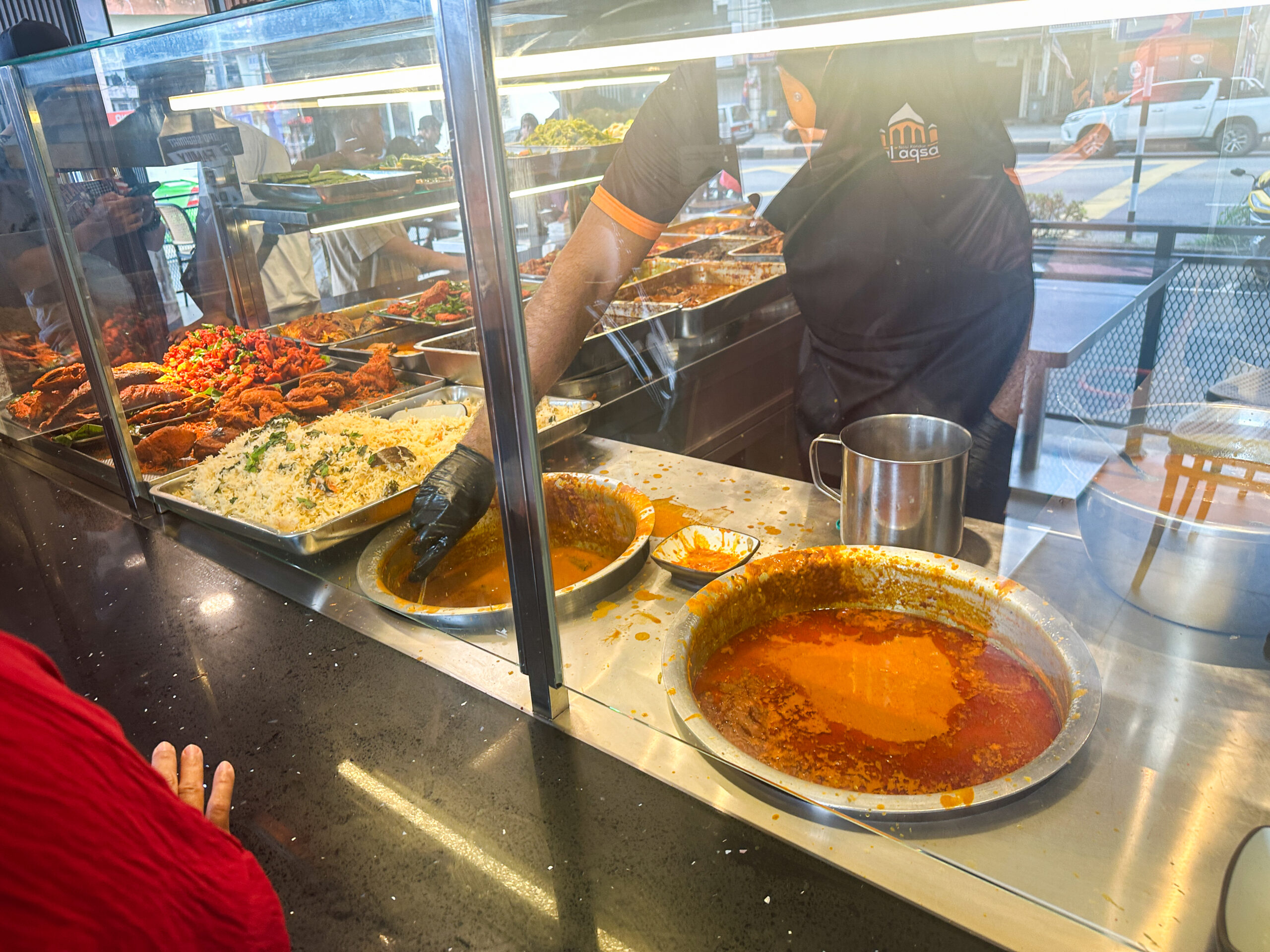  Nasi Kandar Al Aqsaのカレーソースをかけたご飯　「クア・チャンプル（Kuah Campur）」